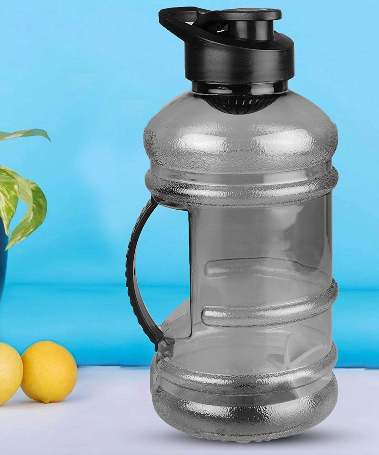 Water bottle with mixer and strainer for sports