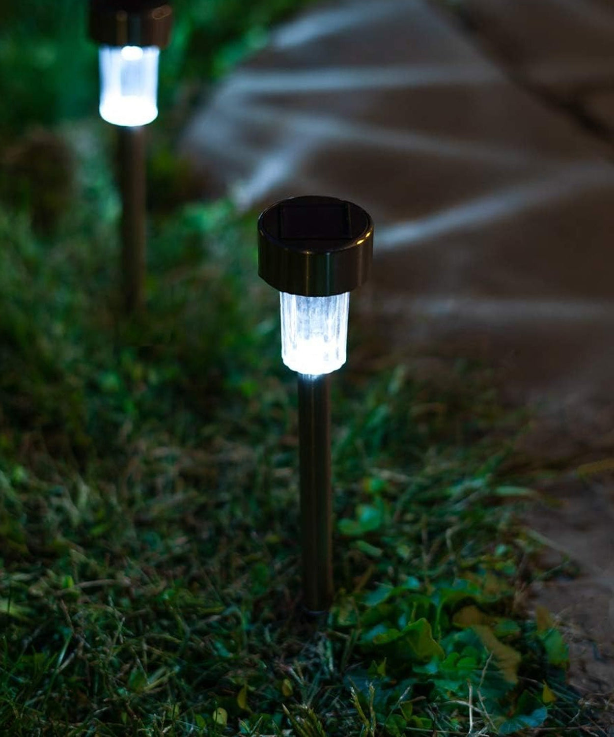 Functional LED solar spike light for brightening garden and walkway.