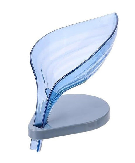 Self-draining leaf-shaped soap holder.