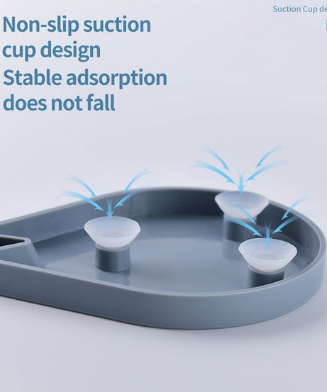 Bathroom soap dish with a leaf shape for drainage.