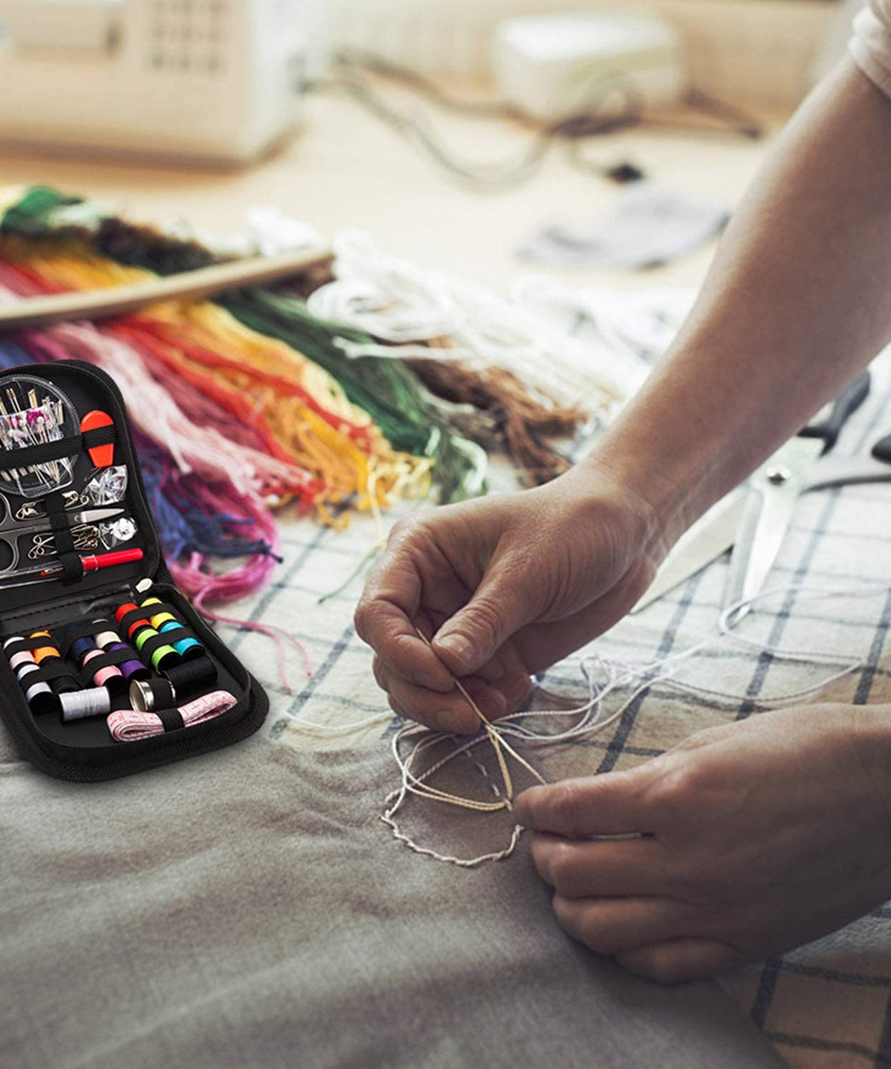 Multi-functional 48-piece sewing kit with accessories for household and travel sewing needs.