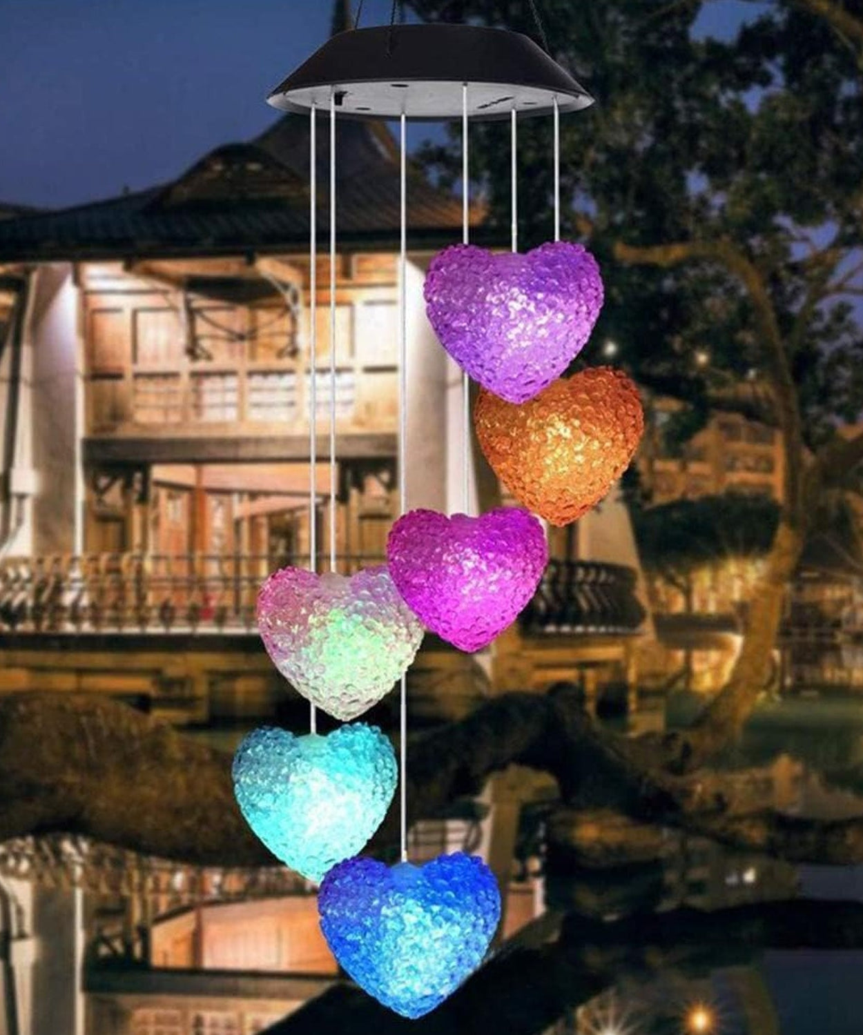 Solar-powered wind chimes with LED lights, perfect for garden decoration.