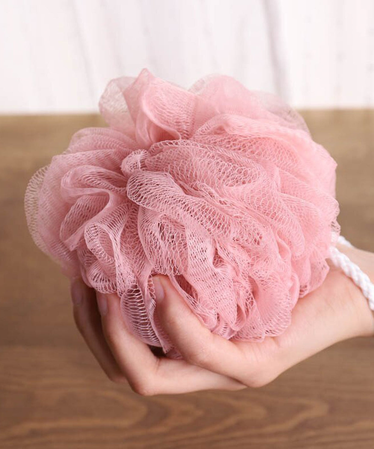 Back scrubber with loofah sponge for body care