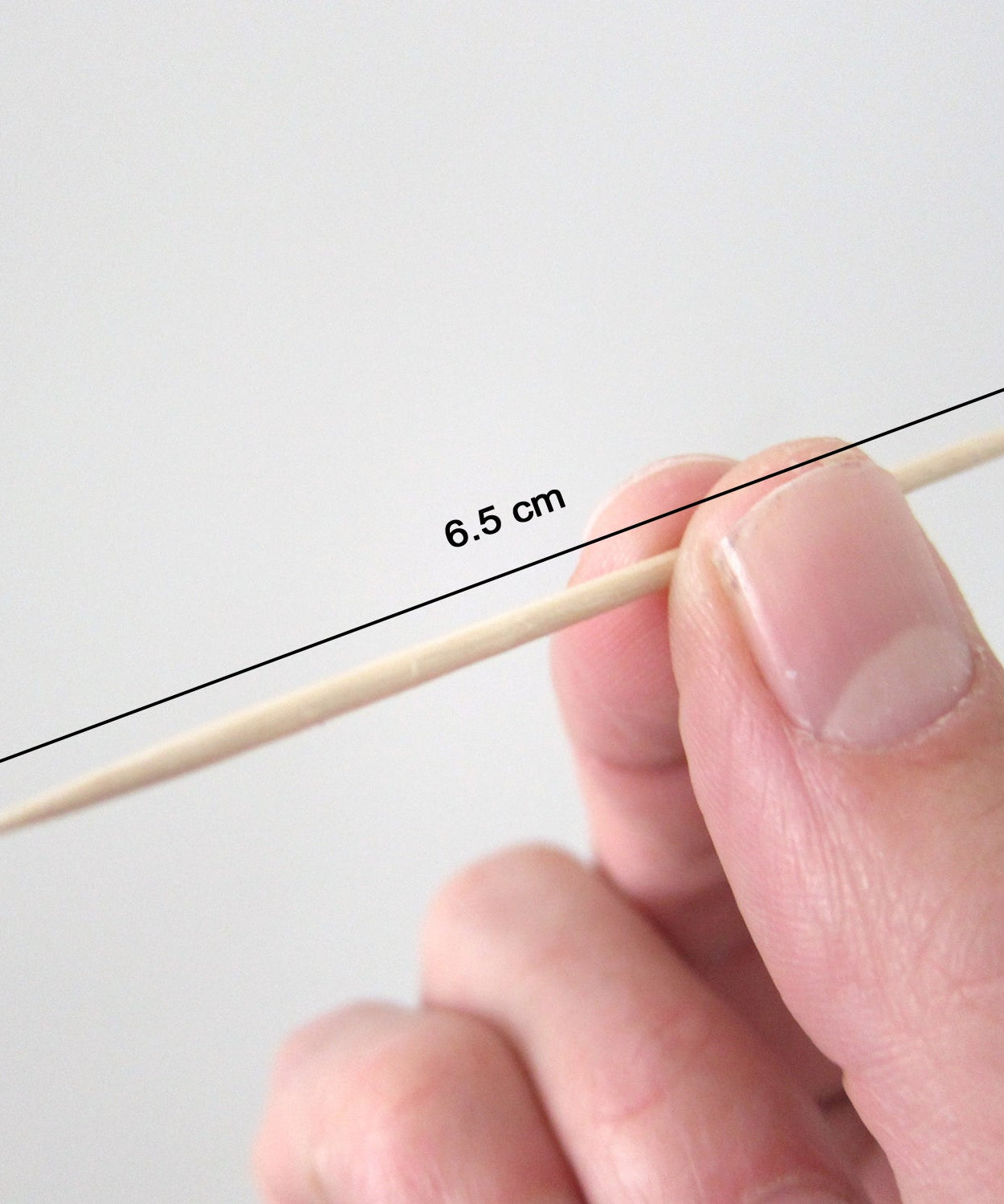 Double sided toothpicks detailed look in plastic box