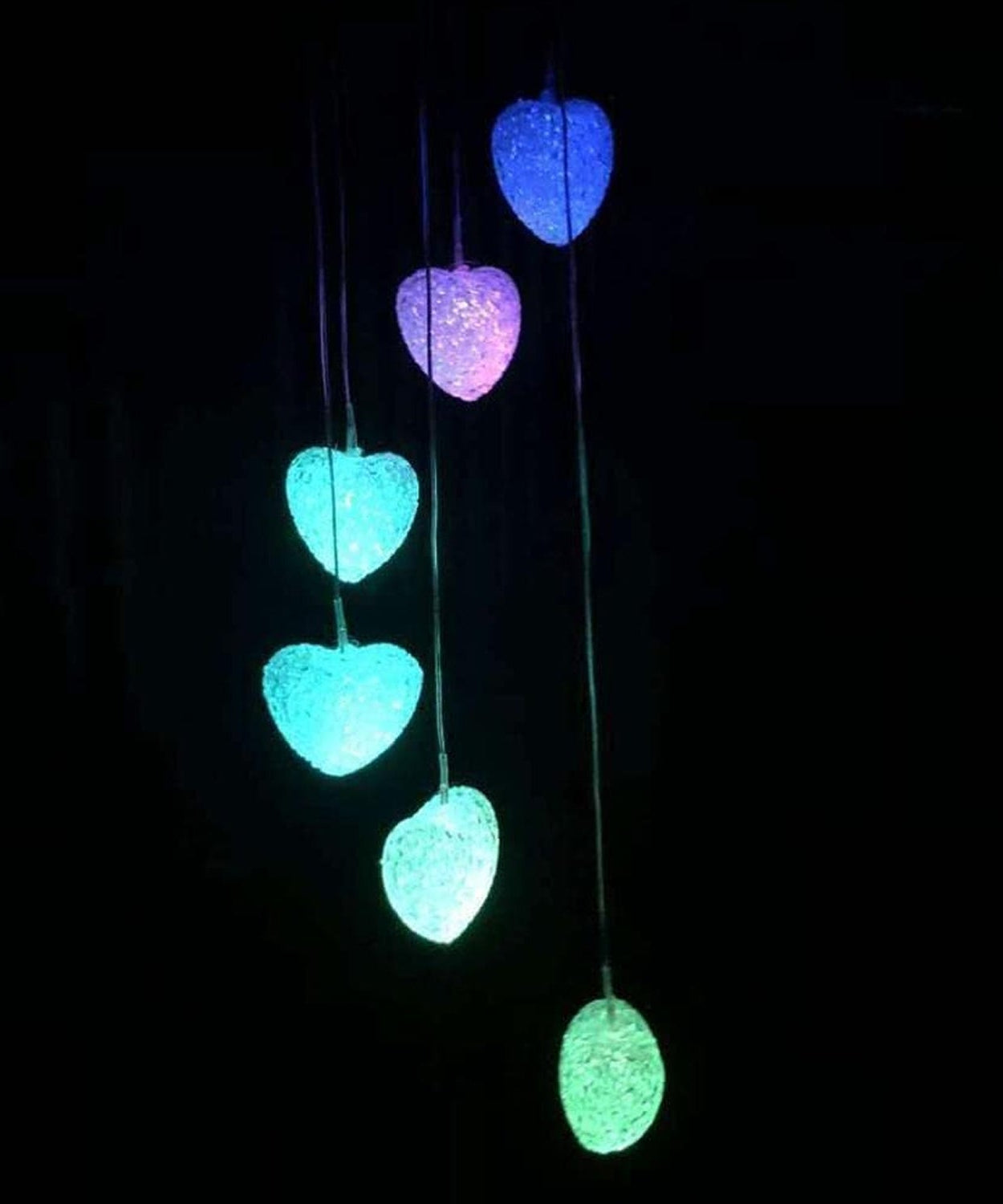 Garden wind chimes with solar power and LED lights for nighttime ambiance.