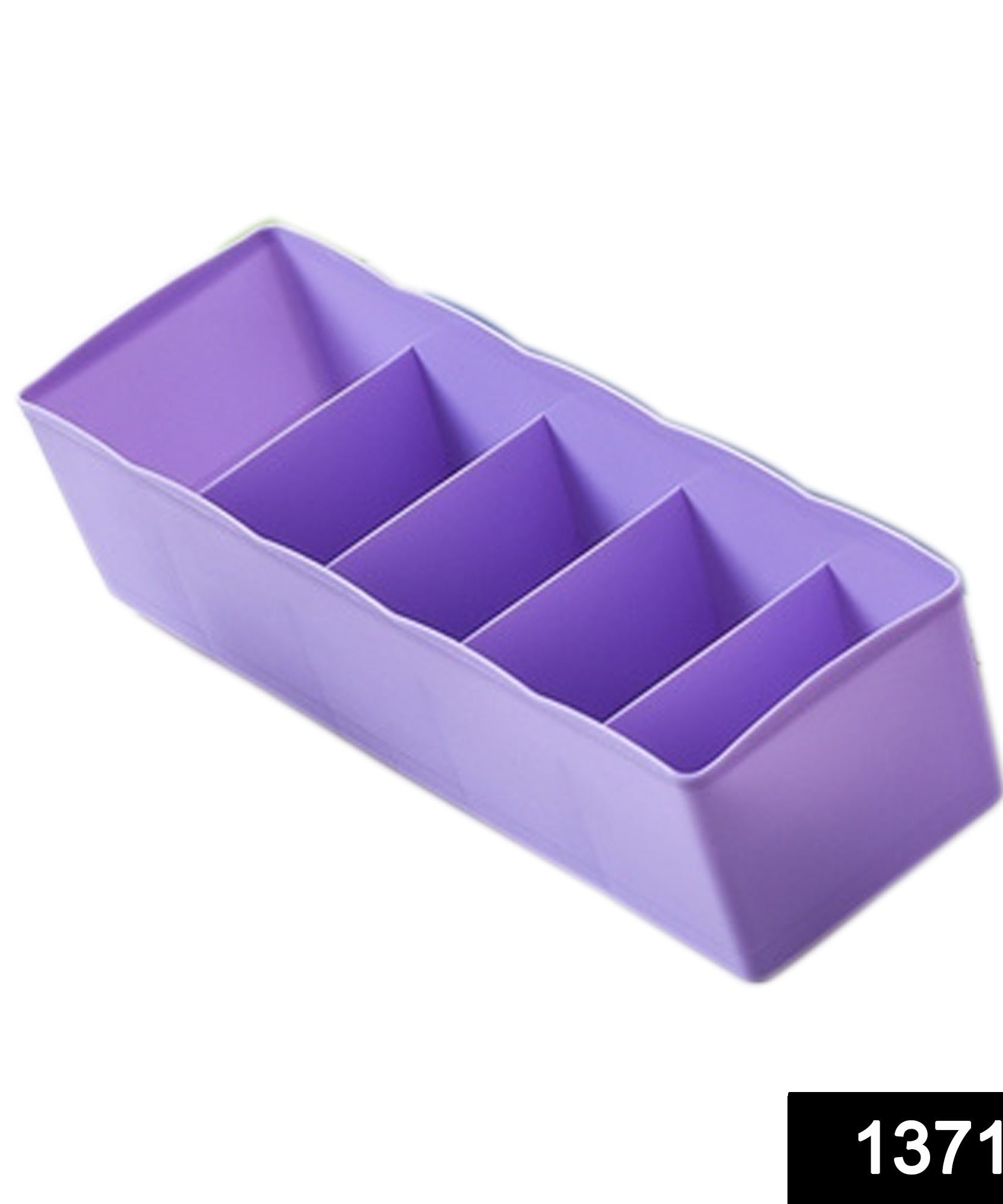 Clear plastic tray with dividers, used for storing beads and craft supplies.