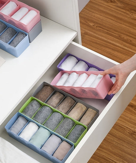 Plastic organizer tray with dividers, designed for bead and small parts storage.