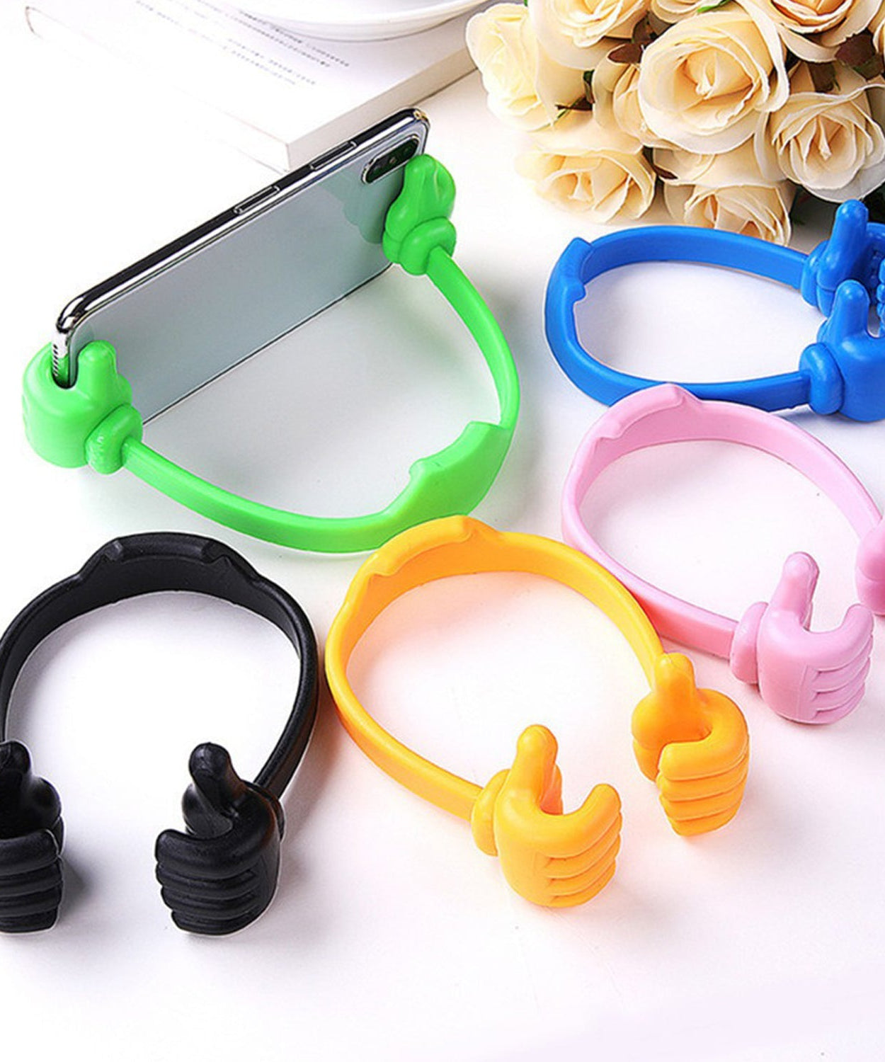 Hand-shaped mobile stand for easy phone support at home and office.