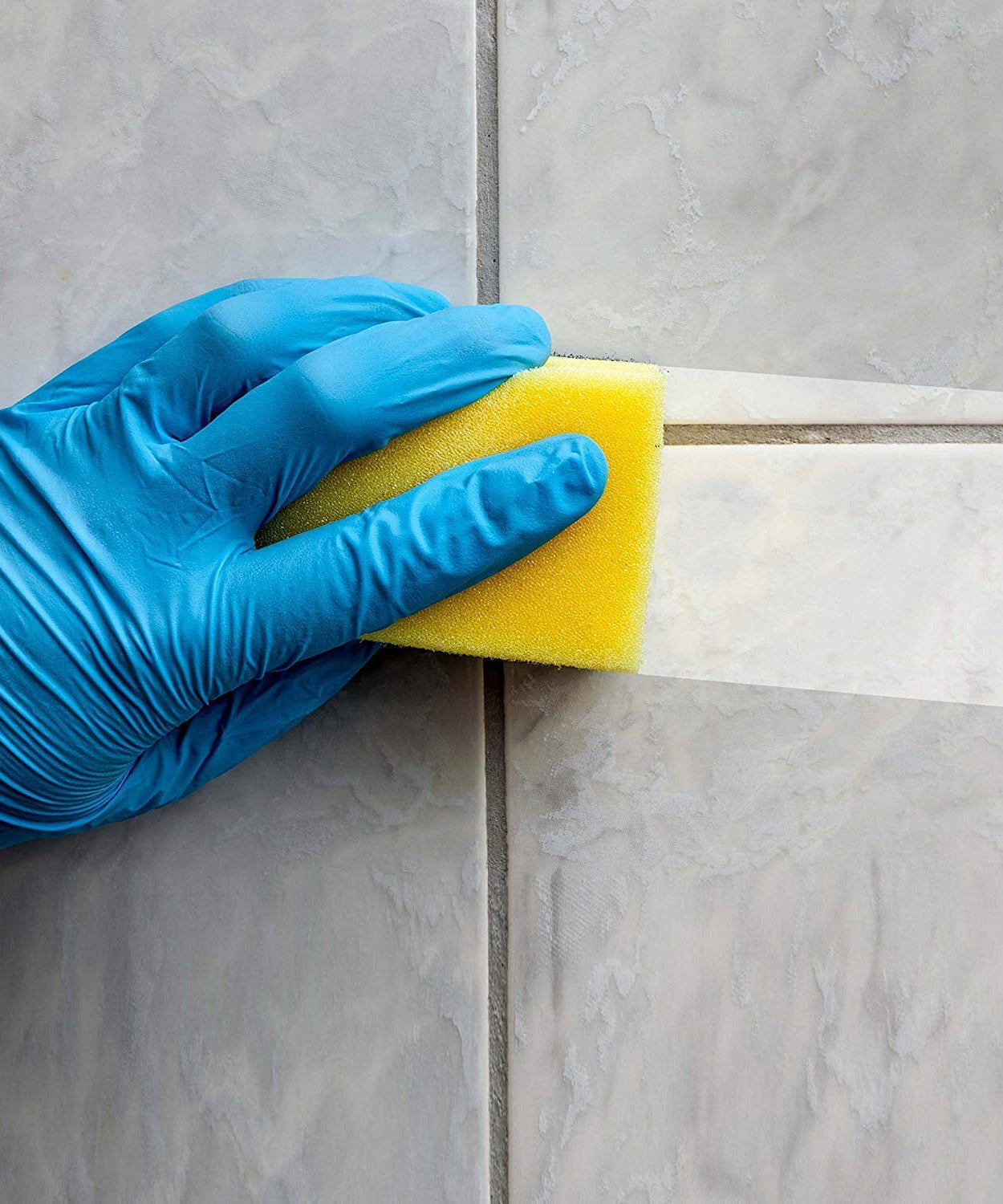 Durable scrub sponge, 2-in-1 design, perfect for cleaning kitchen and bathroom surfaces.