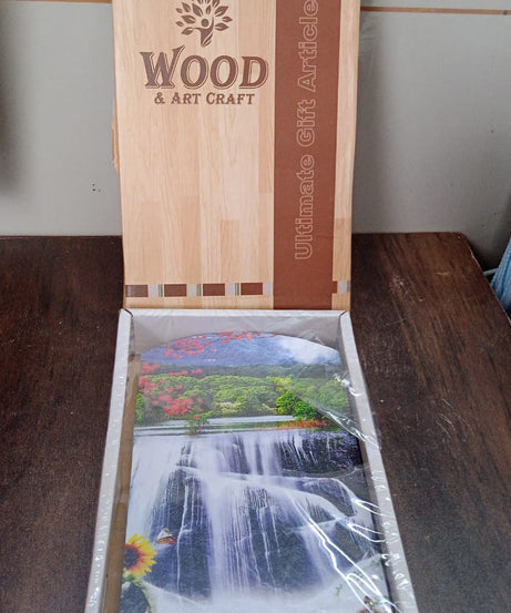 Elegant vertical wooden scenery art with hooks for wall decor.