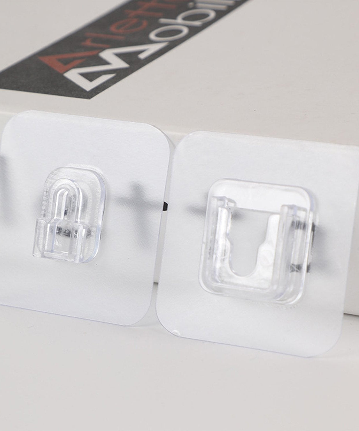 Pack of 20 heavy duty adhesive hooks, for reliable wall mounting.