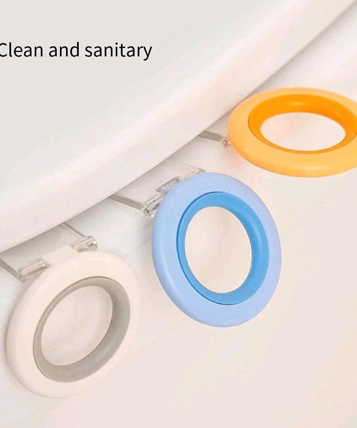 Sanitary toilet seat lifter handle for hands-free lifting