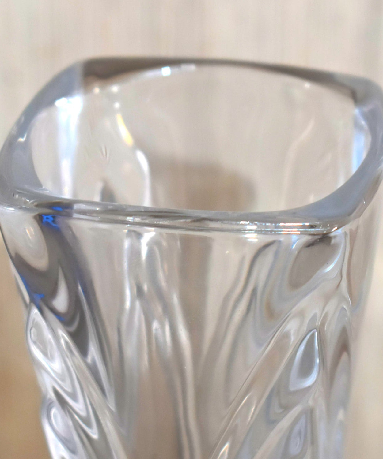 Decorative glass flower pot for living space.