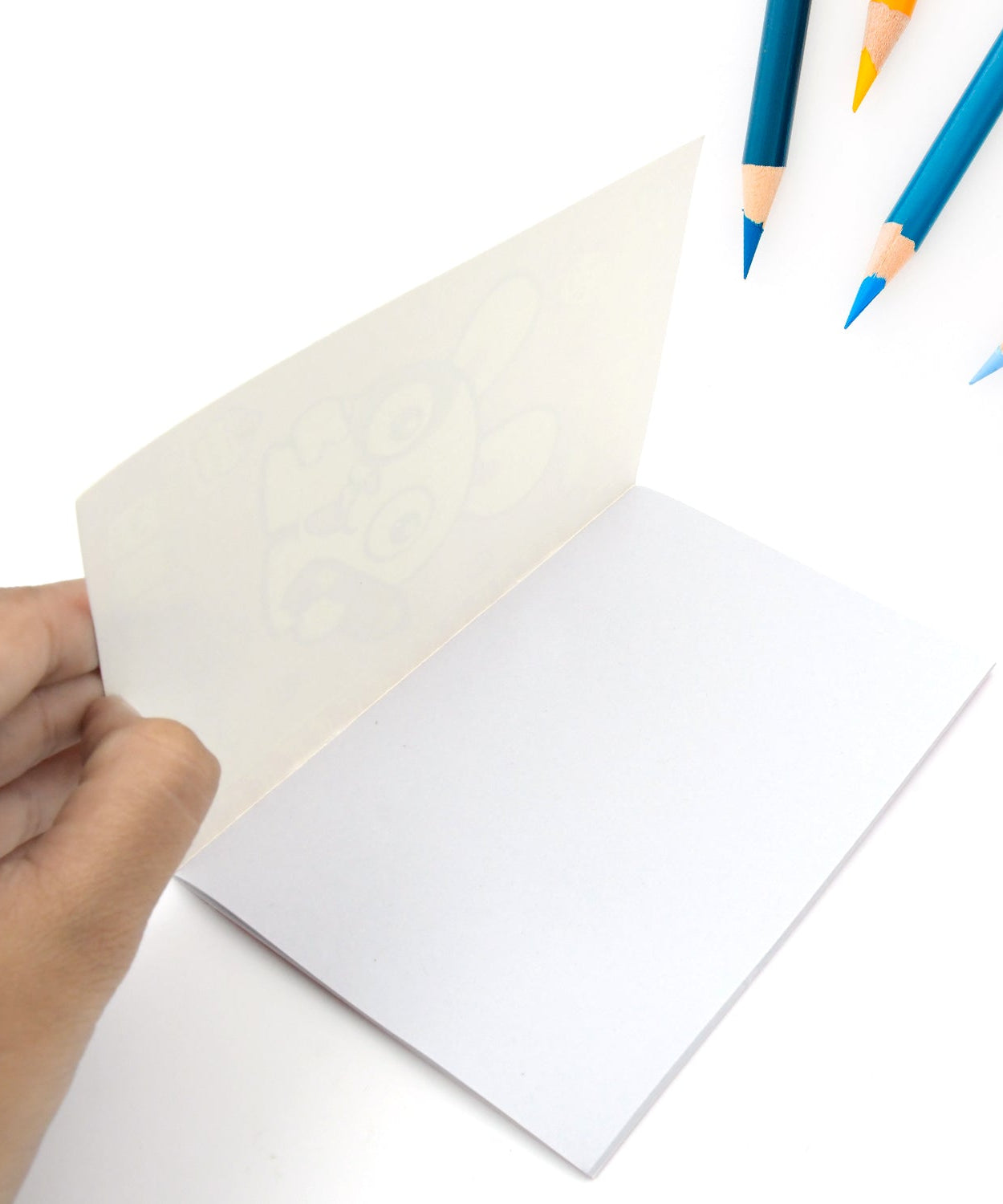 Kids' stationery kit with wooden pencils, sharpener, and eraser.