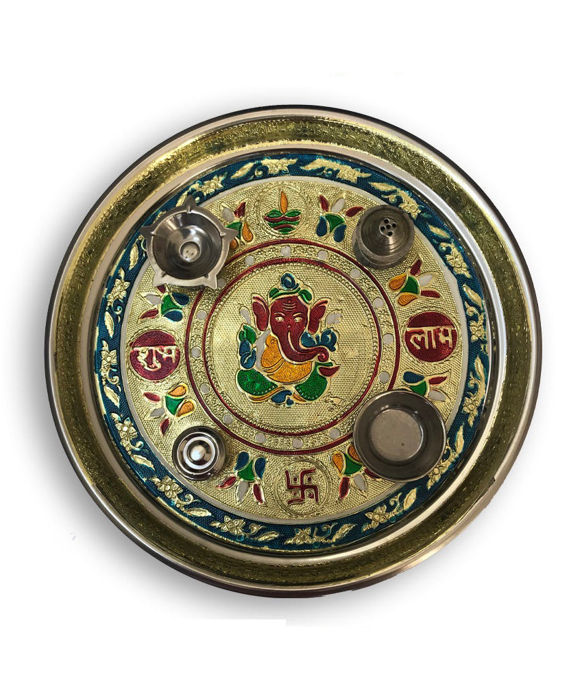 Stainless steel pooja thali with golden and colorful embellishments
