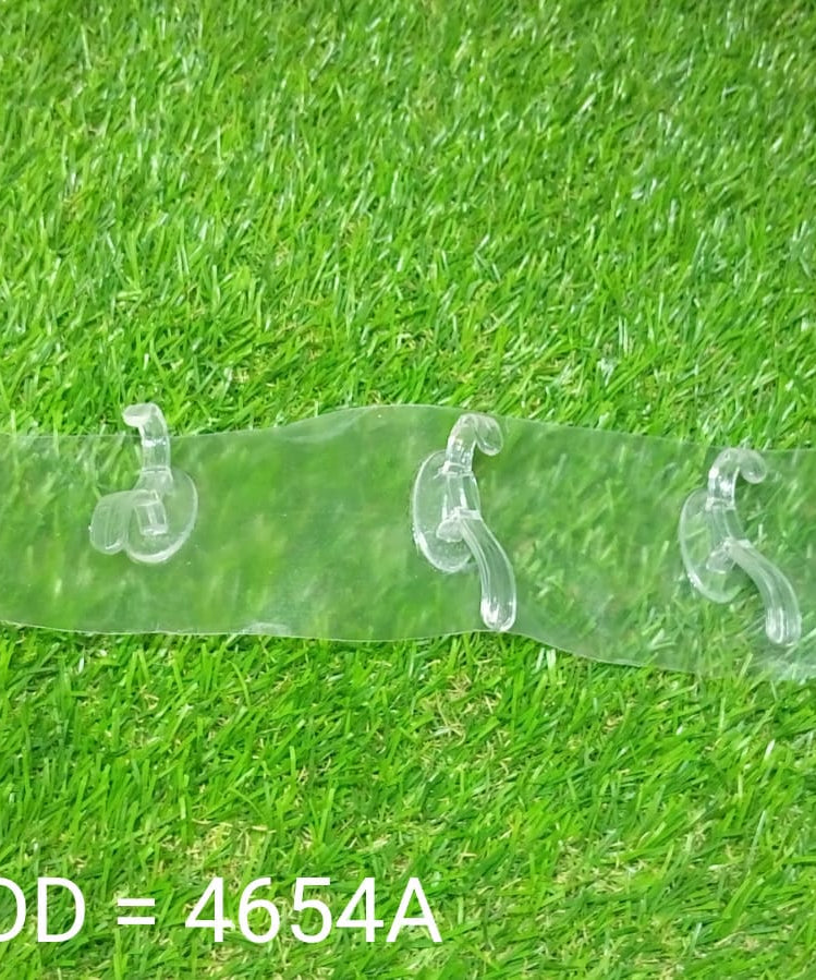 Transparent adhesive wall hook, shown in usage