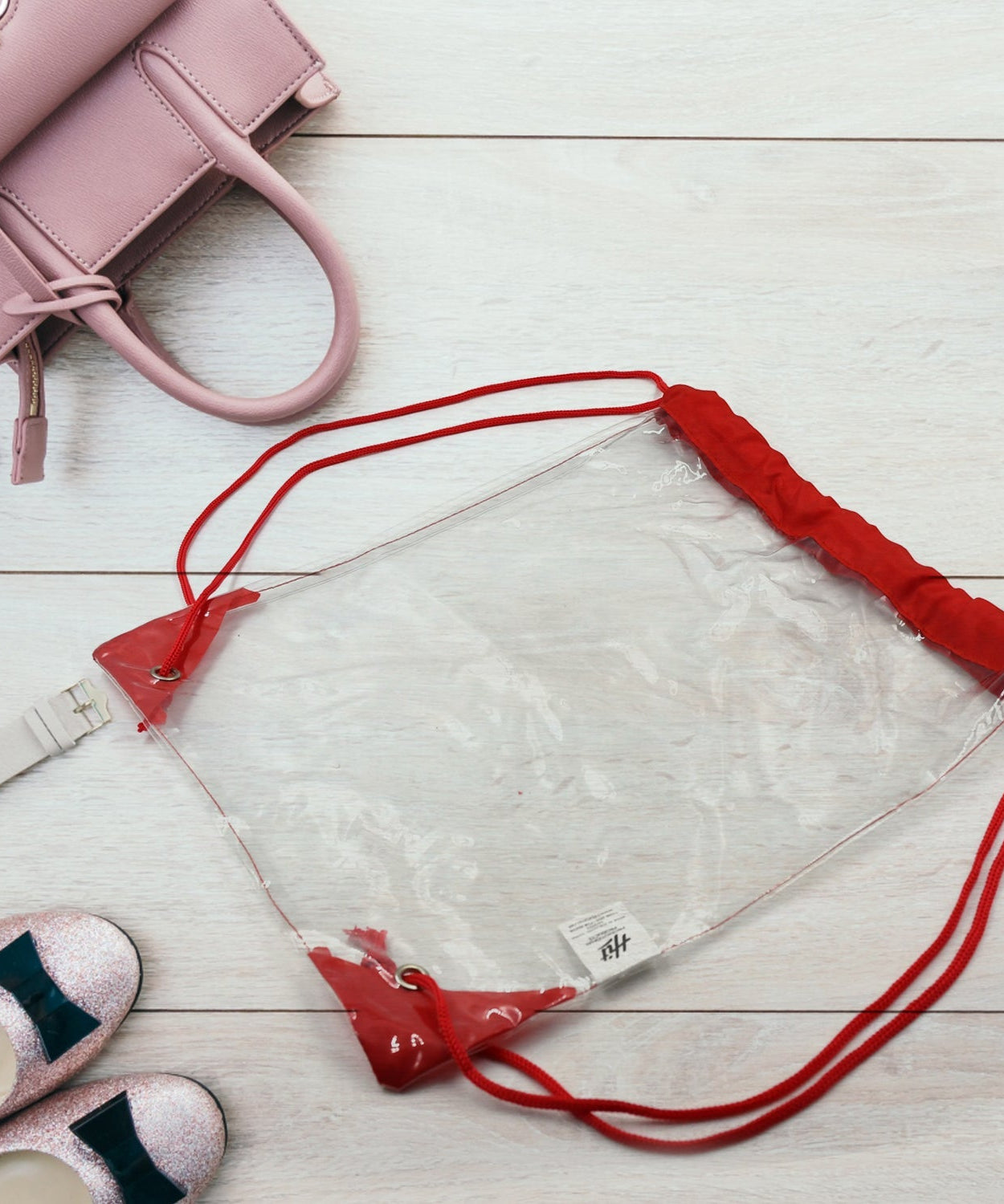 Transparent plastic waterproof pouch for gym, travel, and sports.