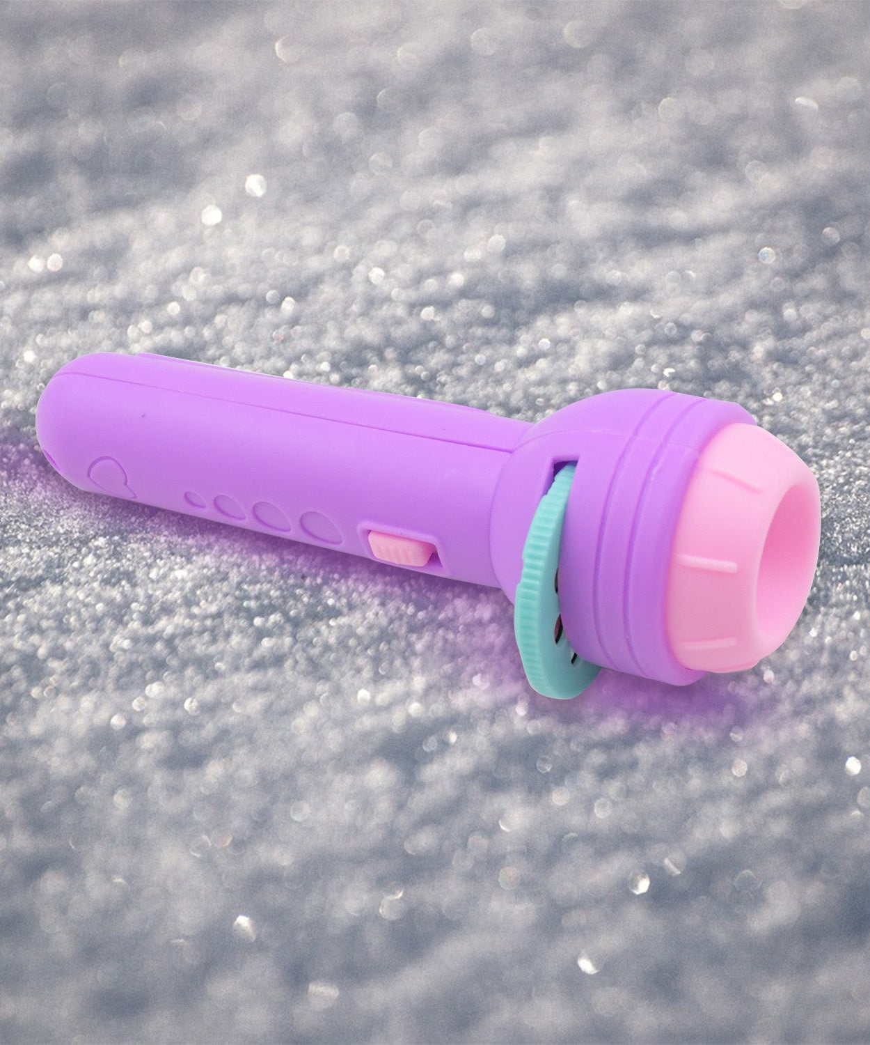 Kids' mini projector with animated slide patterns