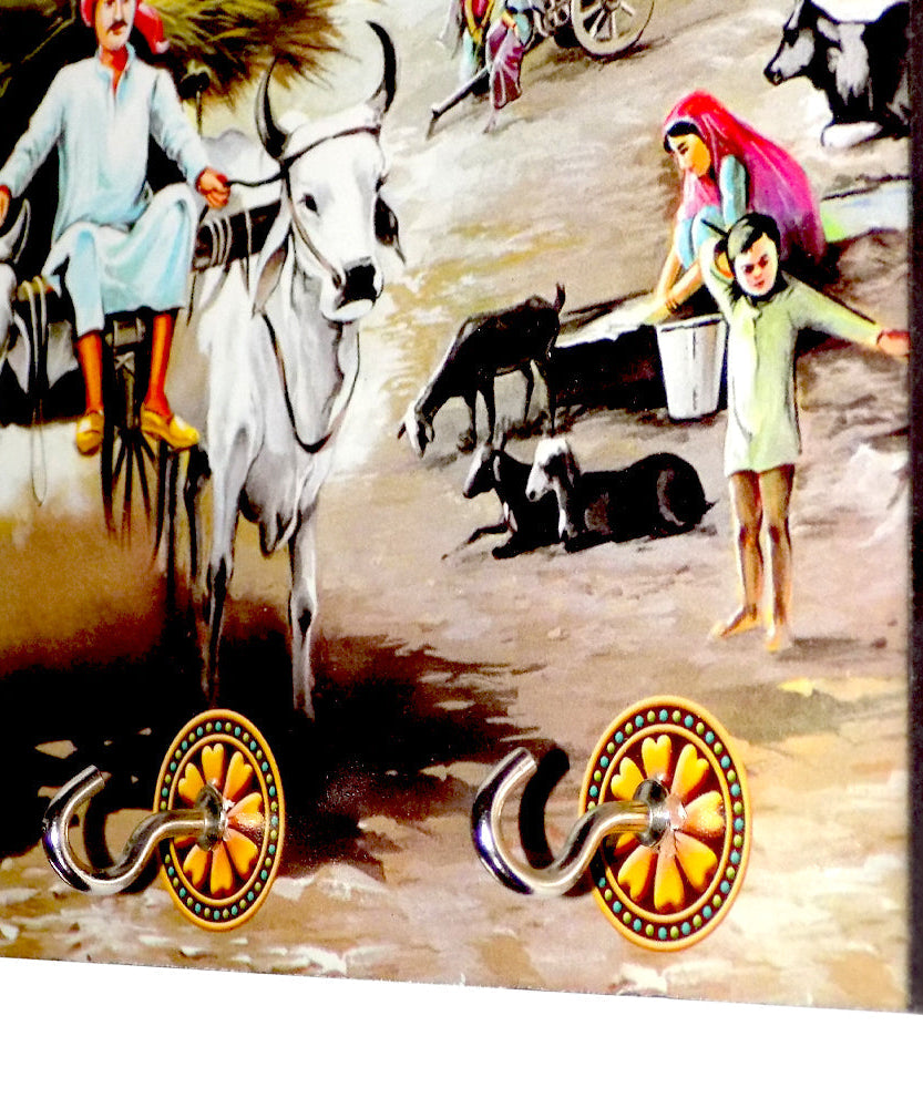 Wooden landscape art with hooks for decorative wall hanging.