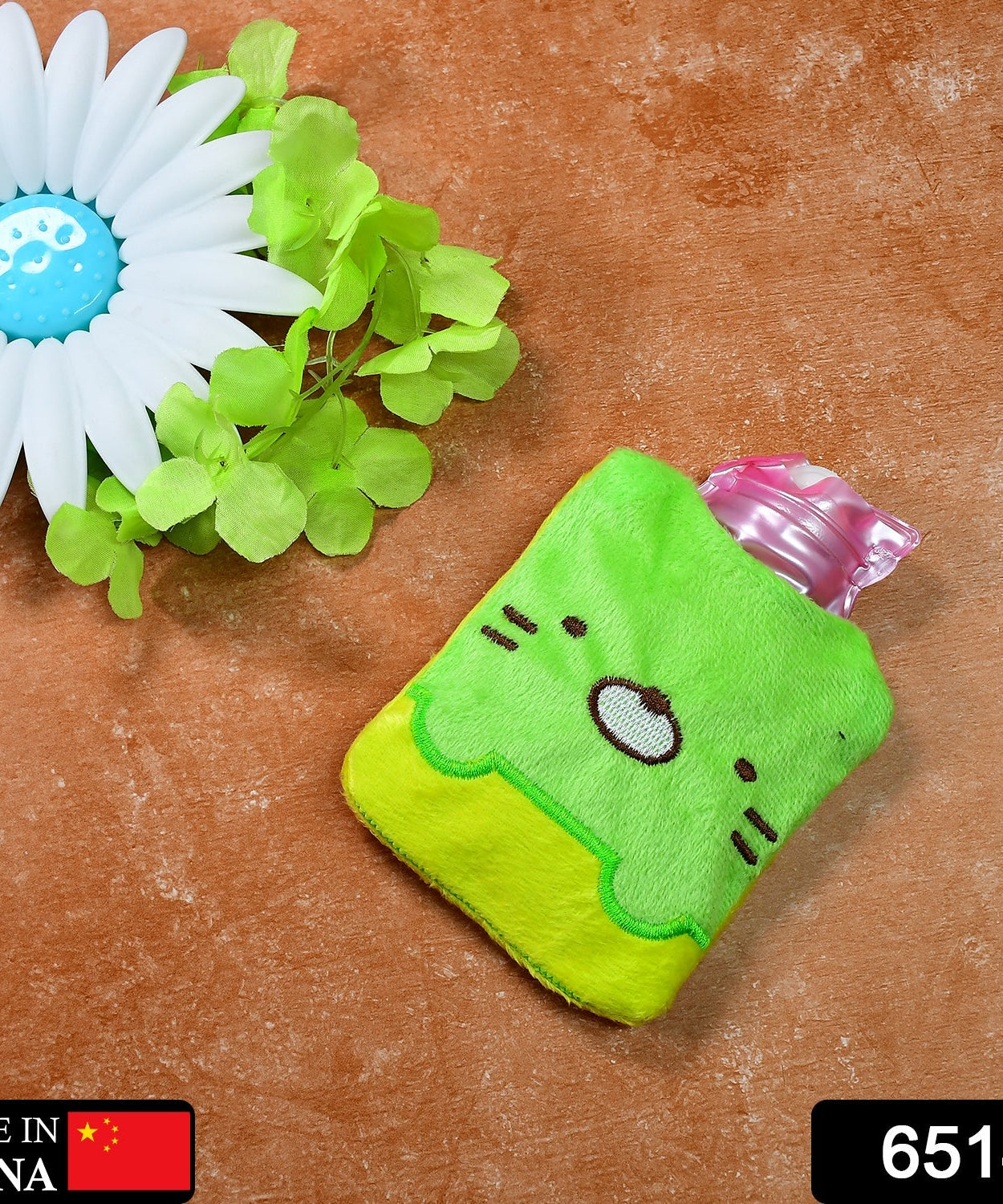 Hot water bag with green Kitty design for neck, shoulder pain, and cramps
