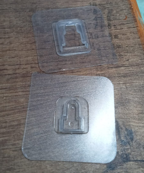 Magic adhesive hooks, heavy duty, pack of 20, for versatile wall hanging.