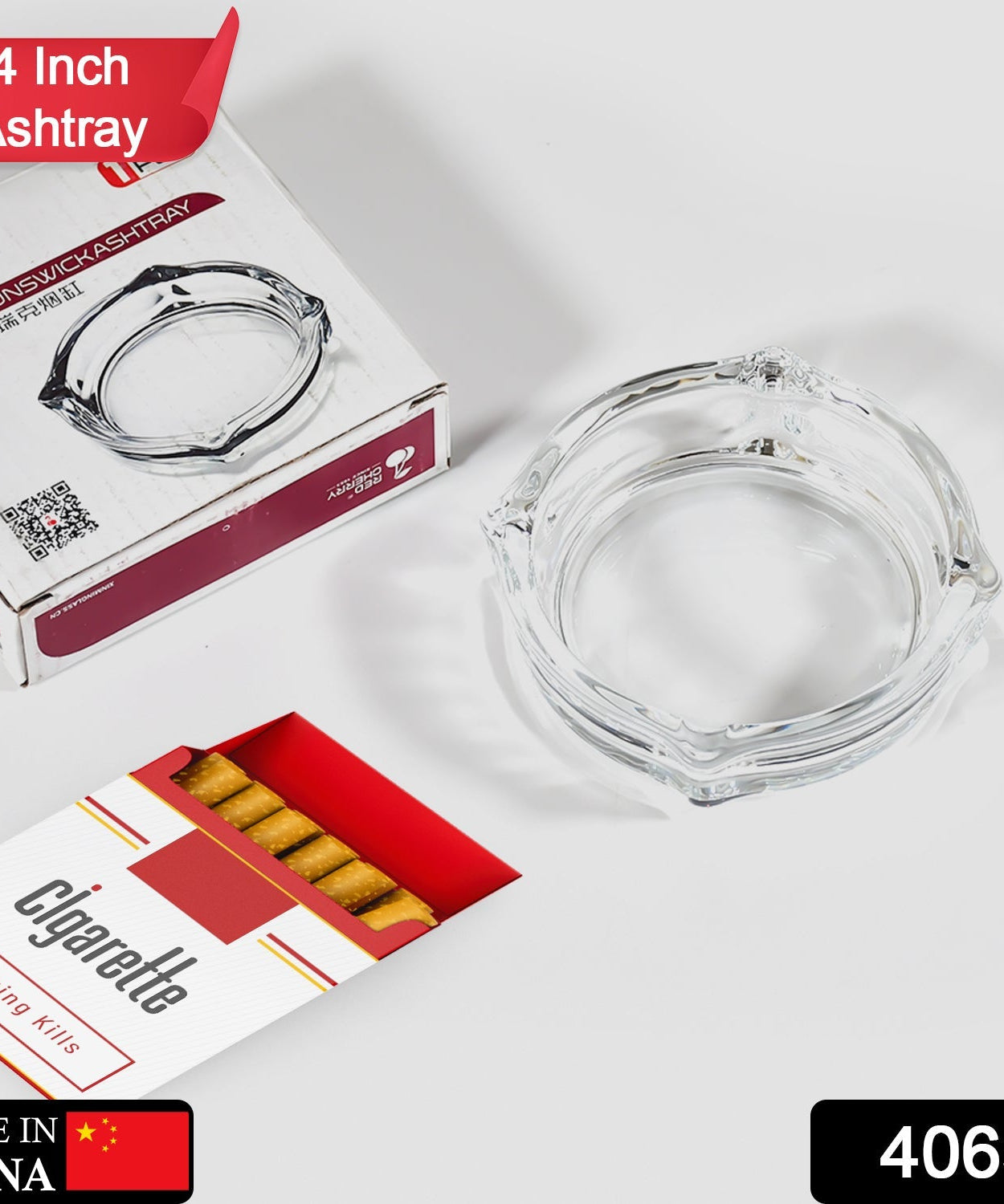 Round glass ashtray for home or office use.