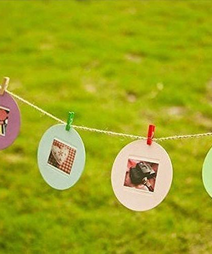 Small wooden cloth pegs for laundry or crafts.