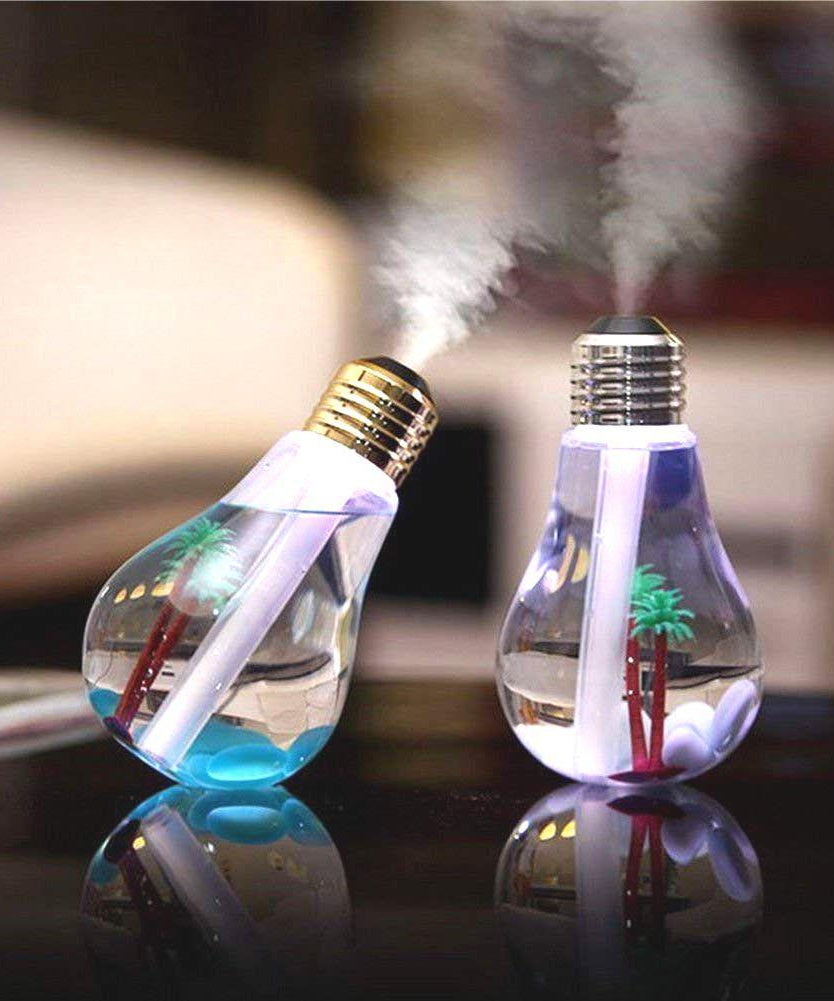 Automatic air freshener with built-in sanitizer and visible spray mechanism.