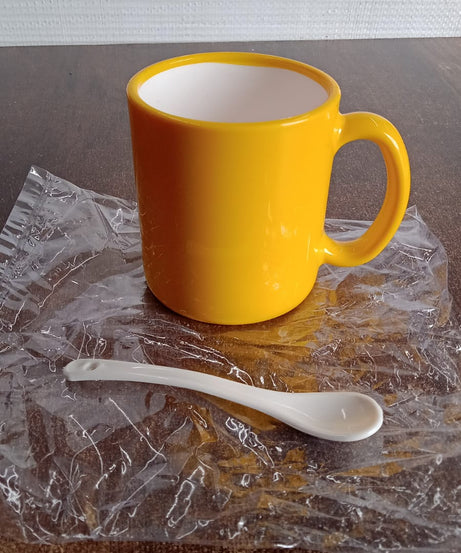 Elegant Ceramic Mug with Matching Spoon