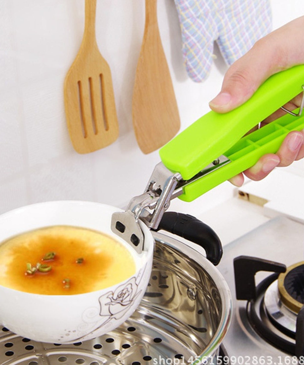 Anti-scald stainless steel plate for protecting kitchen surfaces.