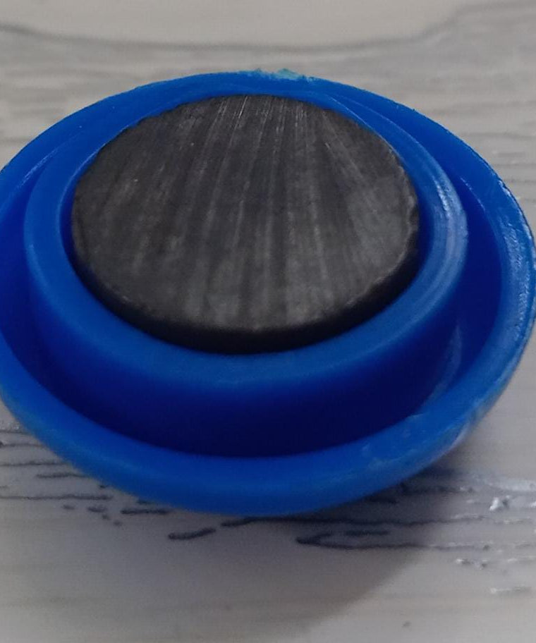 Plastic magnetic buckles for whiteboard use