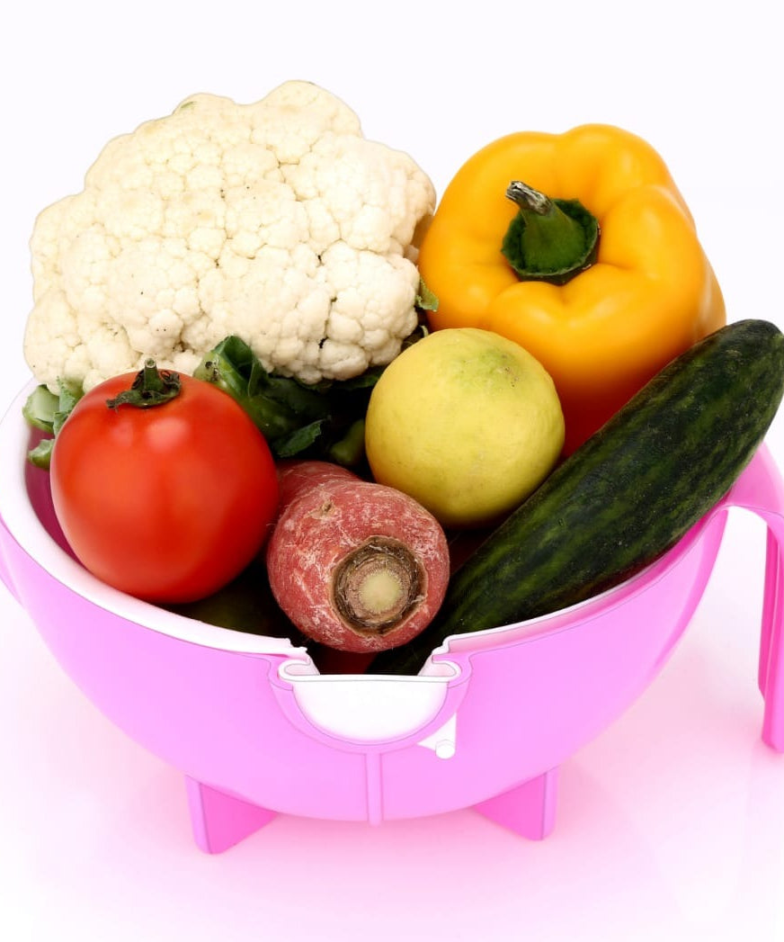 Multi-functional vegetable shredder with built-in drain basket.