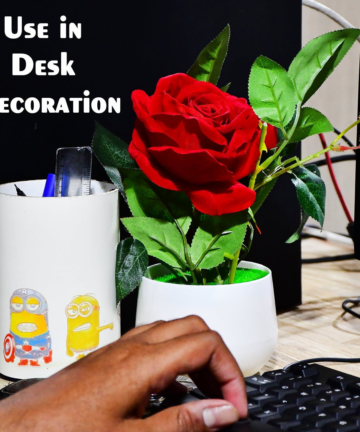 Close-up of artificial rose flower with pot