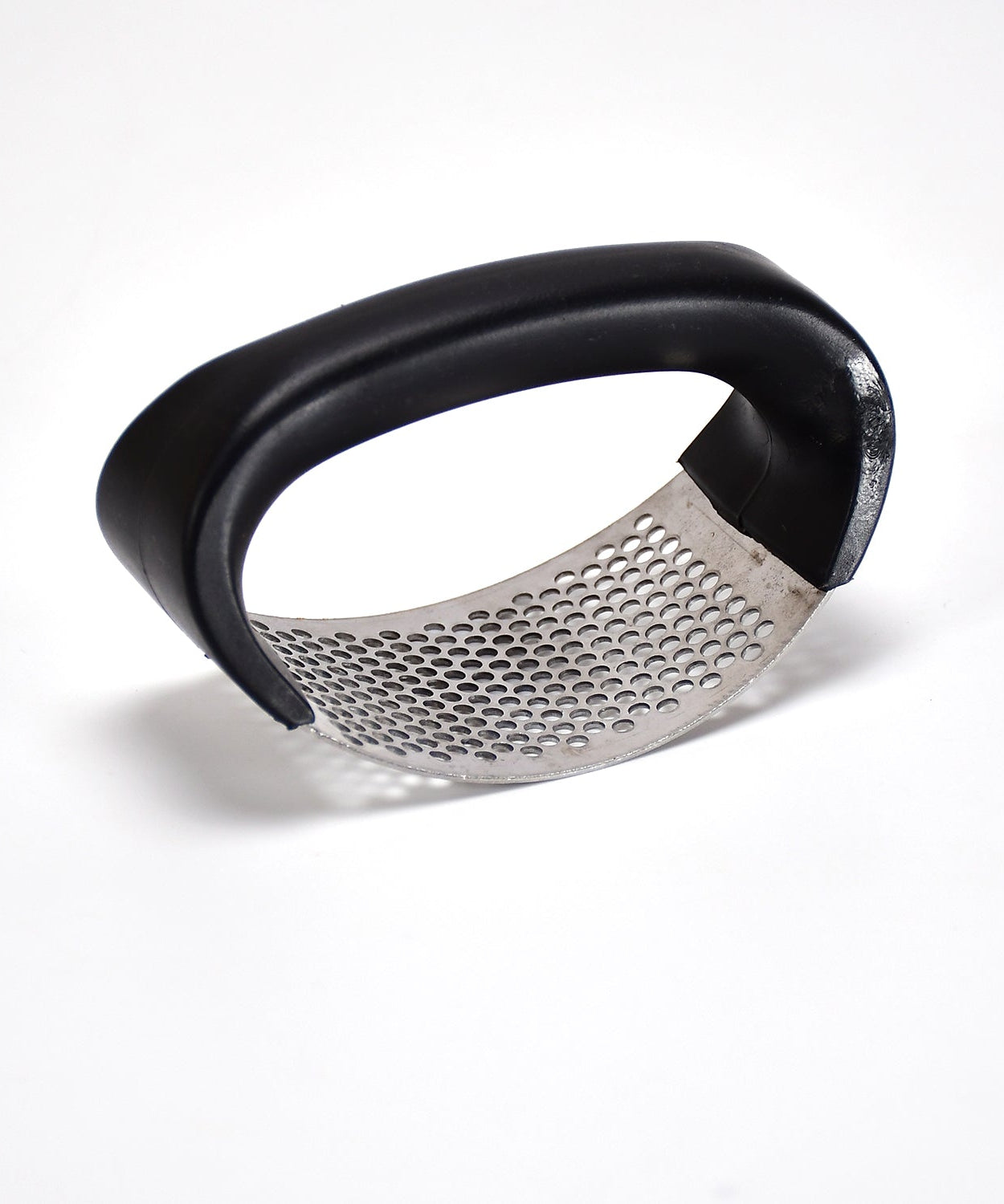 Stainless steel garlic crusher with comfortable grip handle.