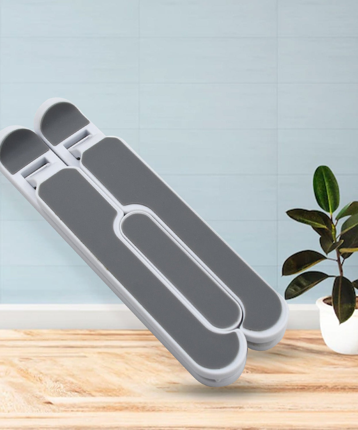 Tablet stand with built-in foldable legs