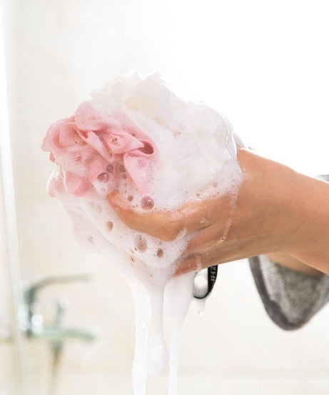Round loofah sponge for exfoliating and scrubbing