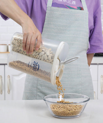 Multi-section transparent storage box, perfect for organizing dry goods in the kitchen.