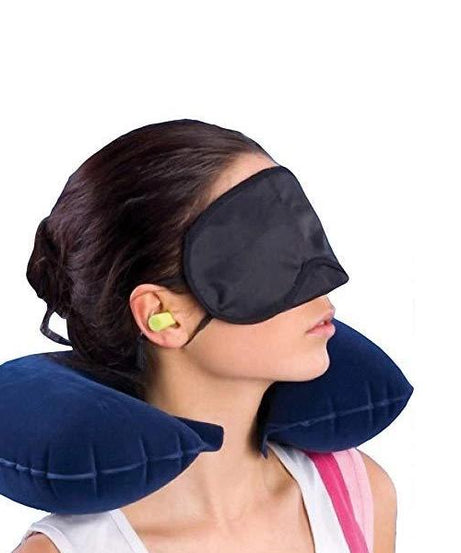 Travel essentials kit with pillow and eye mask.