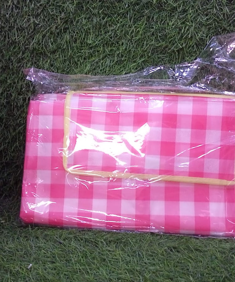 Picnic blanket in a camping setting