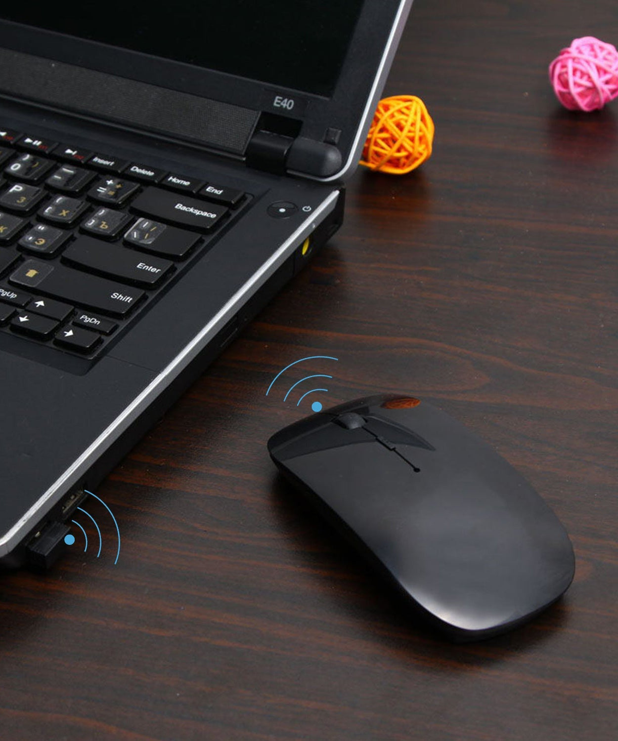 Wireless mouse for laptop, PC, Mac, and iPad, sleek design.