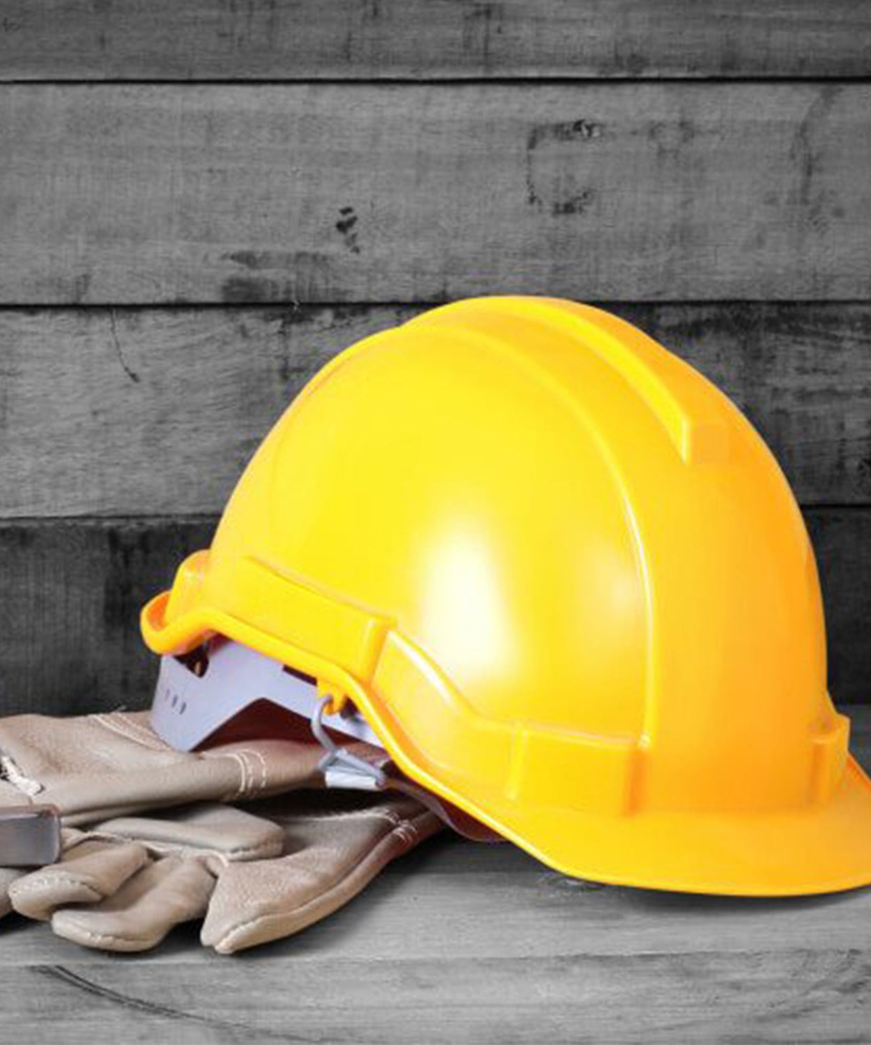 Durable yellow plastic hard hat for construction safety.