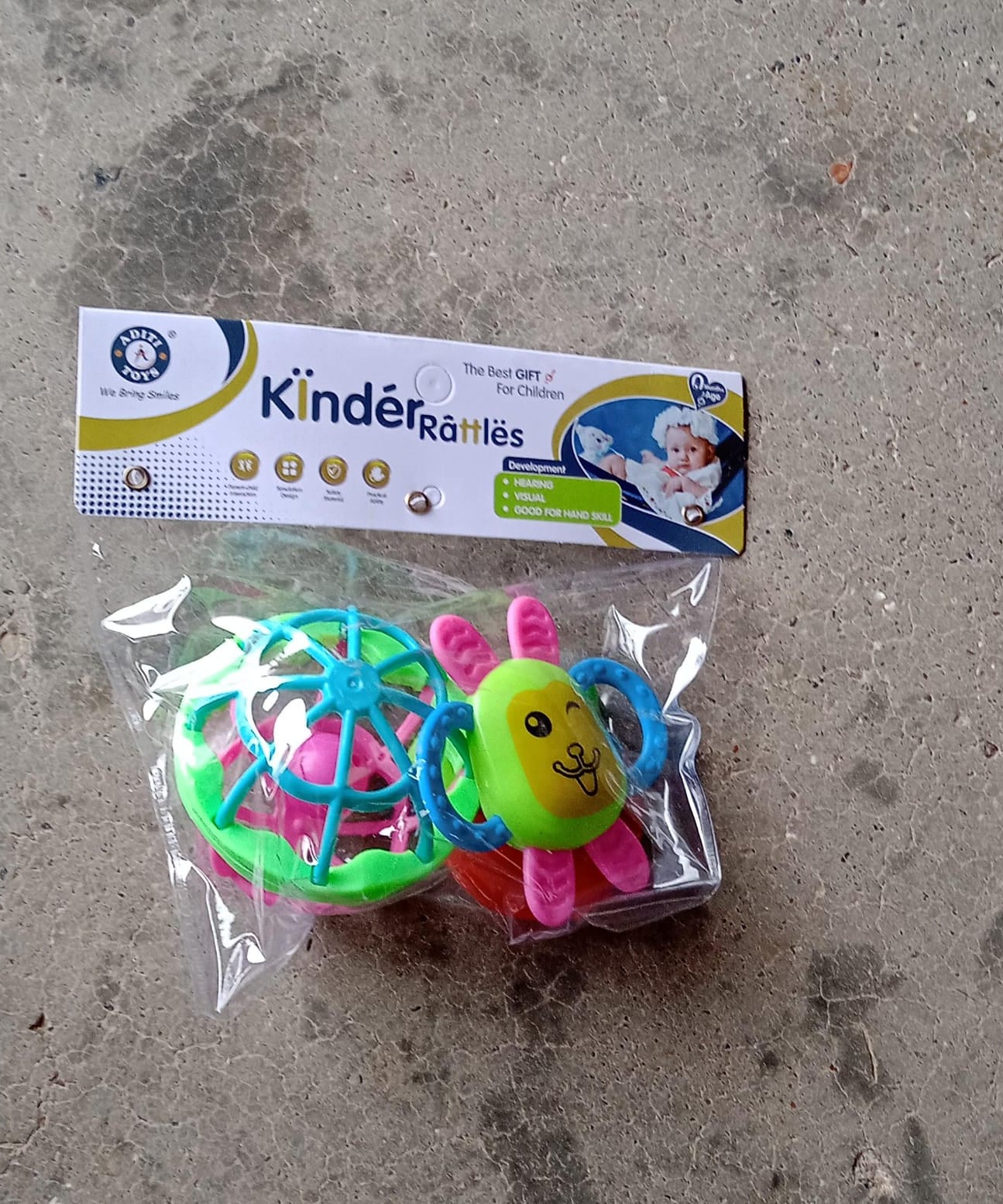 Collection of three colorful baby rattles designed for play and sensory development.