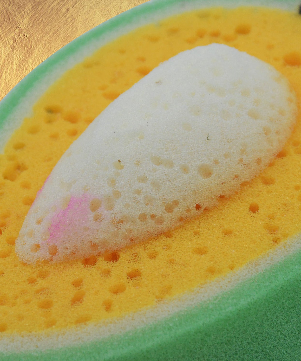 Close-up of mango dish sponge with soft texture