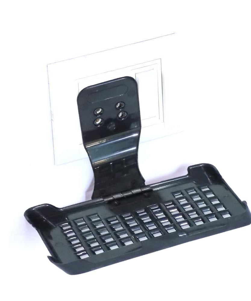 Charging stand with wall mount for mobile phones.