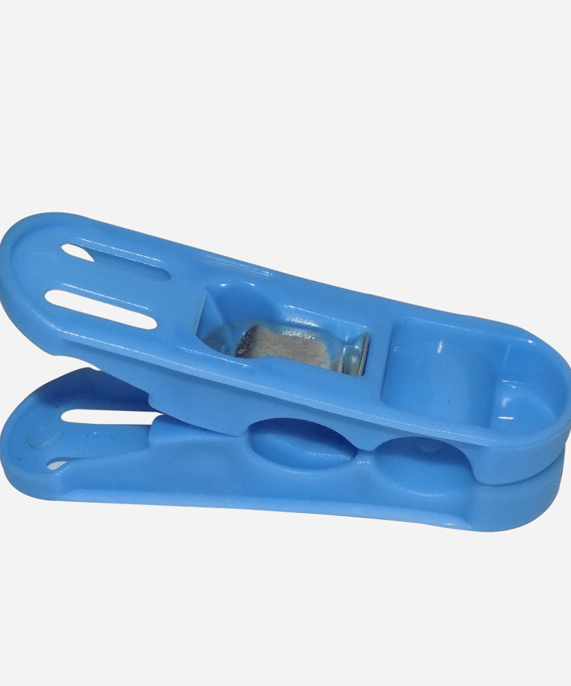 Multicolored plastic clips with strong grip for cloth drying.