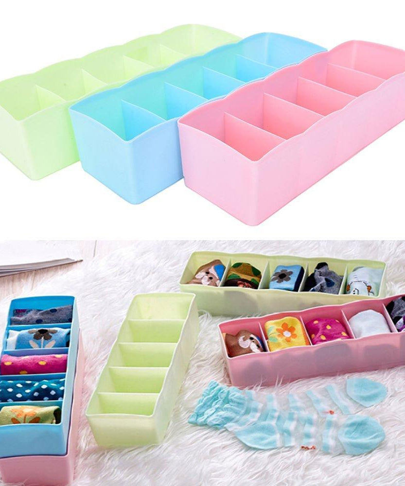 Storage box with 5 compartments for efficient organization of socks and handkerchiefs.