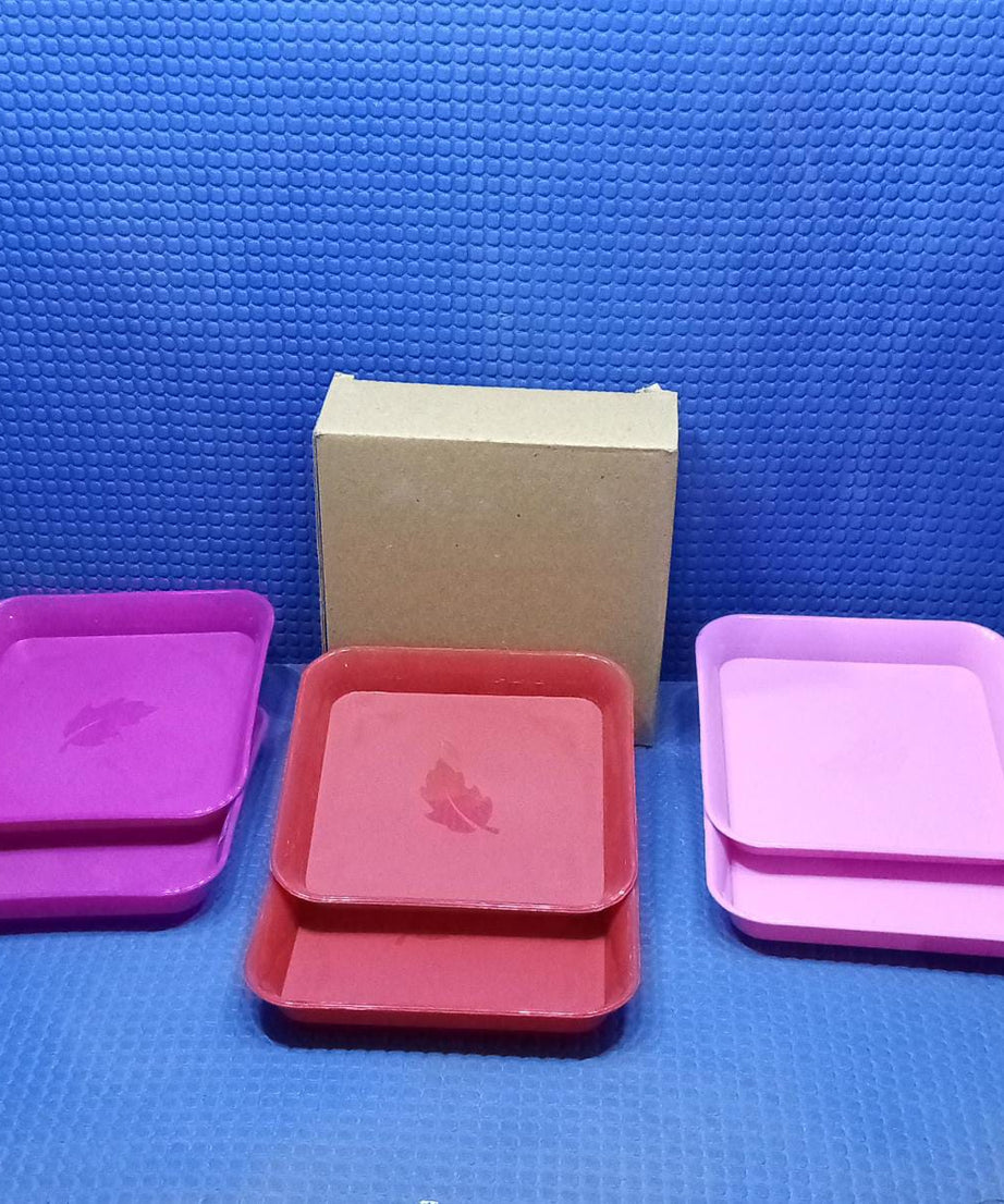 Various colors of square plastic plates.