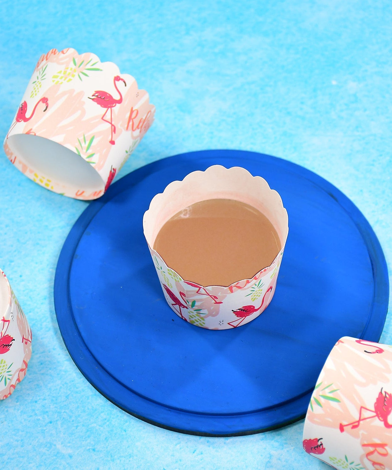 Kitchen tools set featuring a spatula brush, oven glove, egg yolk separator, and paper cup set.