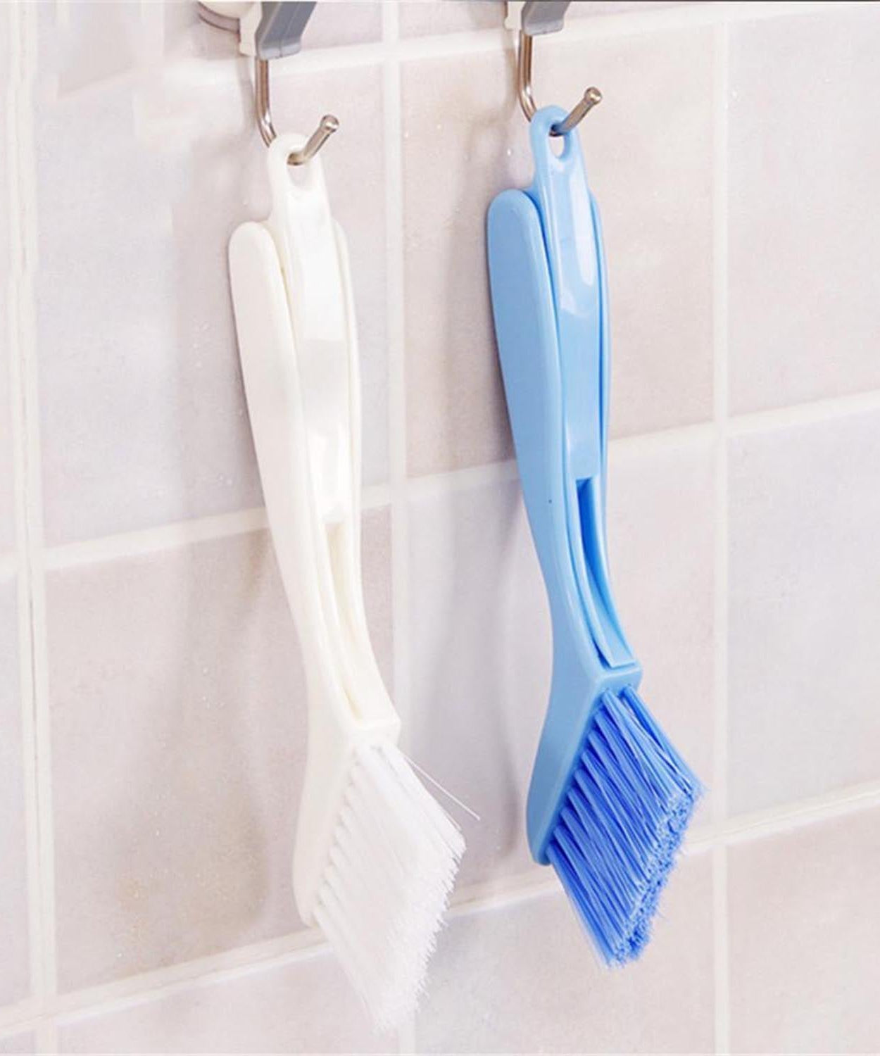 Portable brush and cleaner with an ergonomic handle for easy use
