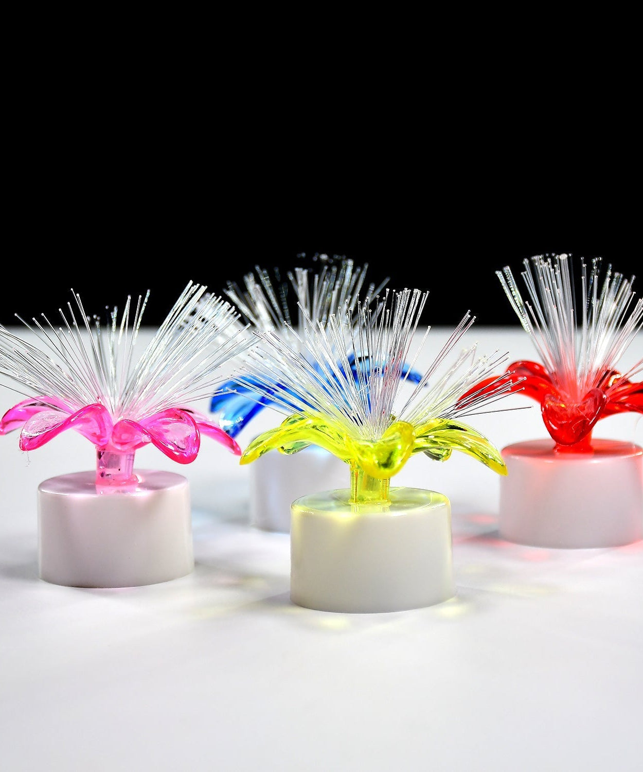 LED table centerpiece with fiber optic light, color-changing.